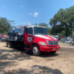 Photo of Melo Buys Junk Cars